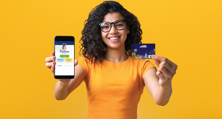 Youth with credit card and phone