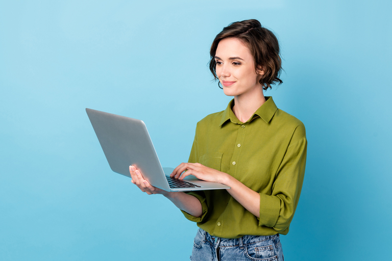 Woman looking at laptop