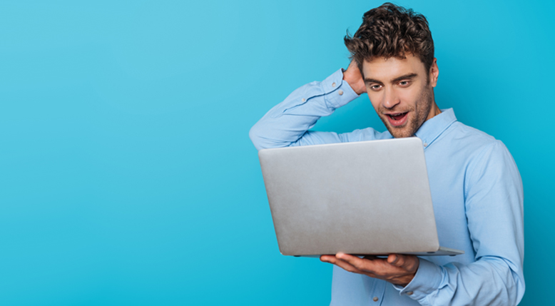 Man looking at a computer