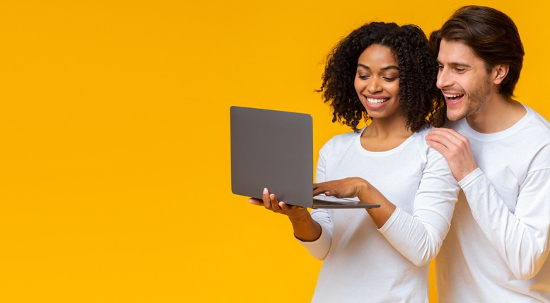 Couple looking at laptop