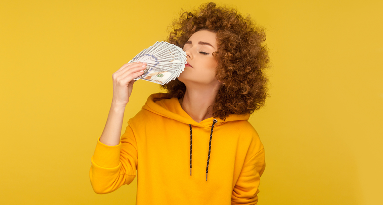 Woman holding cash